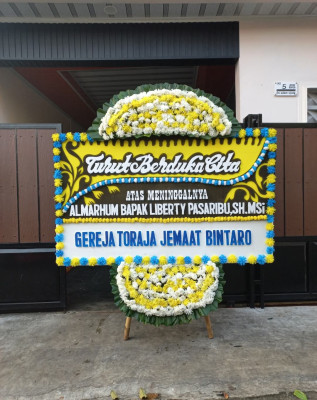 Papan Bunga Duka di Rurukan